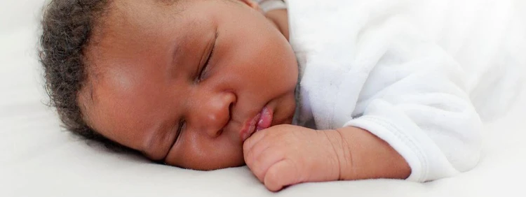 Newborn Grunting and Squirming While Sleeping? What to Know